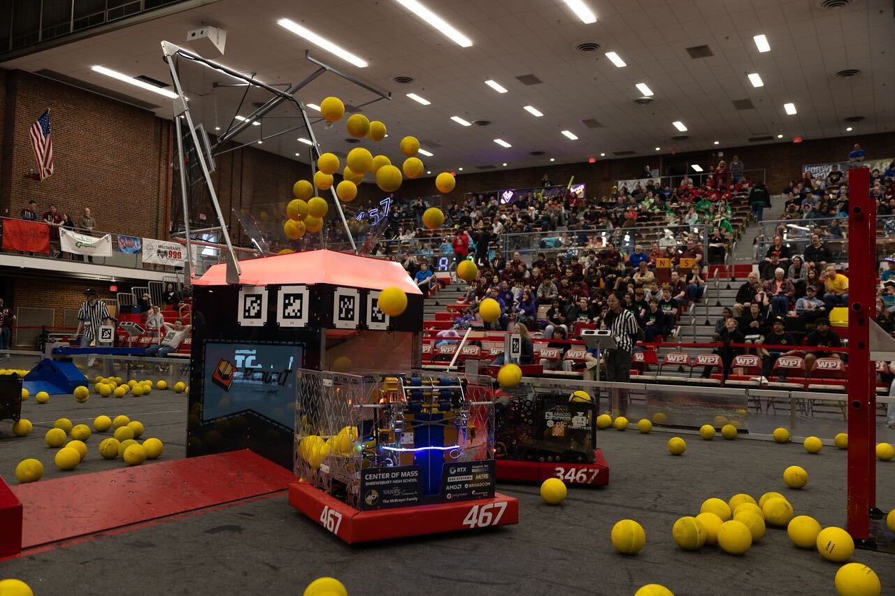 FRC Team 467 robot scoring during a match at WPI