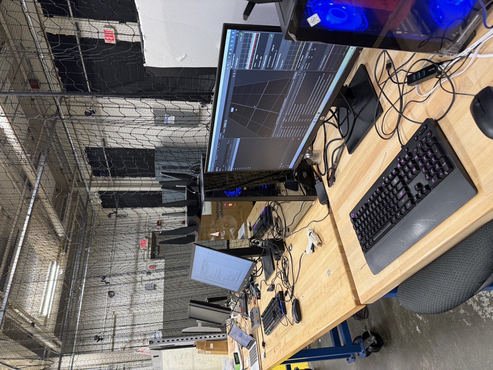 CAD workstation with dual monitors in the FRC 467 team shop